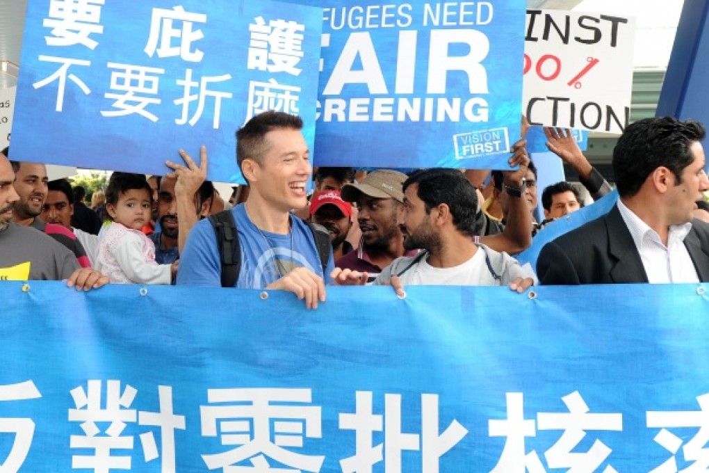 Protesters march during a demonstration by asylum seekers in Hong Kong. Photo: AFP