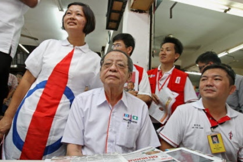 Malaysia's opposition Democratic Action Party (DAP) adviser Lim Kit Siang (centre) surrounded by supporters in Kuala Lumpur. Photo: EPA