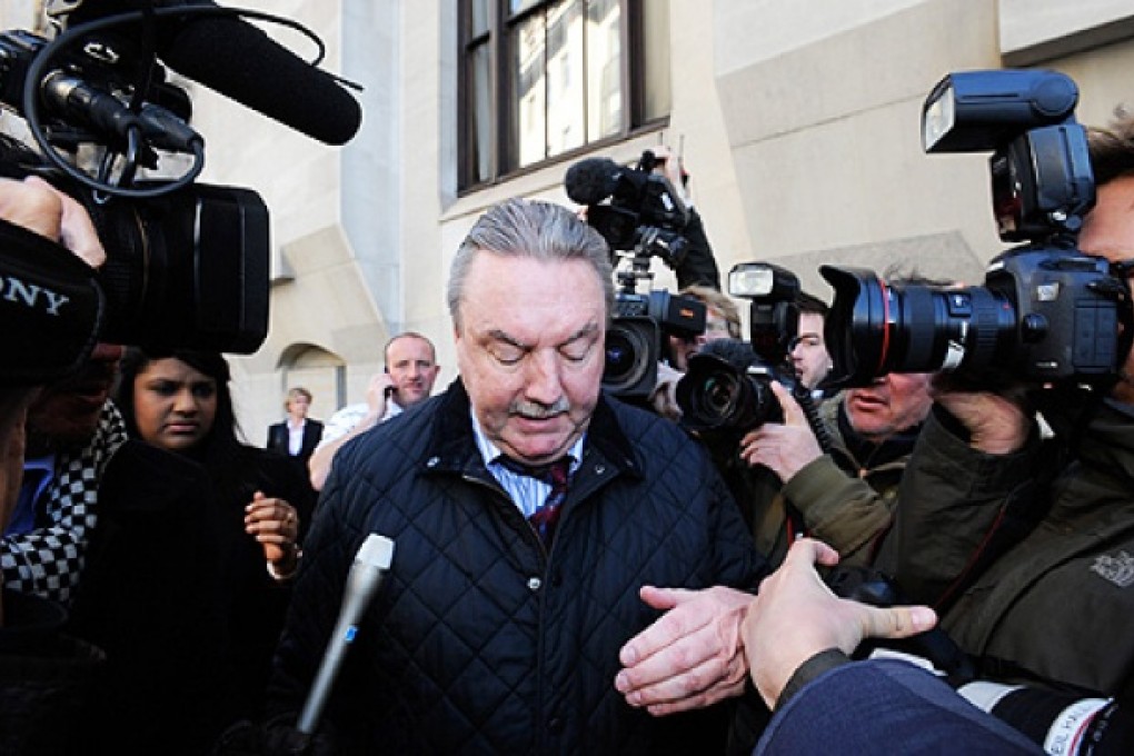 British business man, James McCormick (centre), arrives for sentencing at the Old Bailey in London, Britain, on Thursday. Photo: EPA