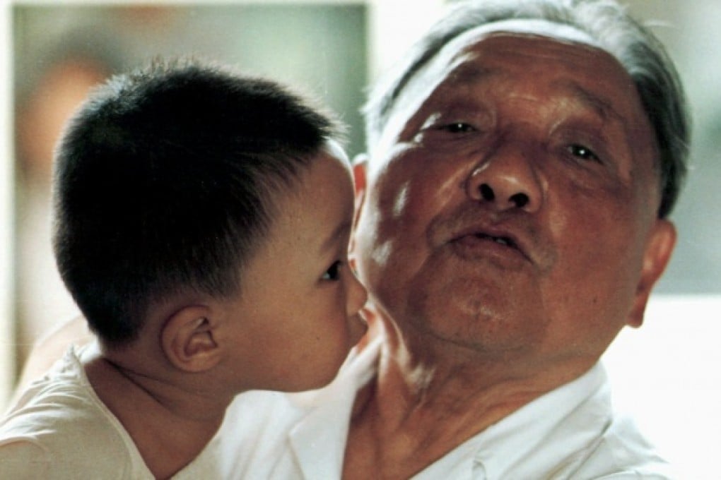 Deng Xiaoping gets a kiss from Deng Zhuodi in this 1986 file photo. Photo: Xinhua