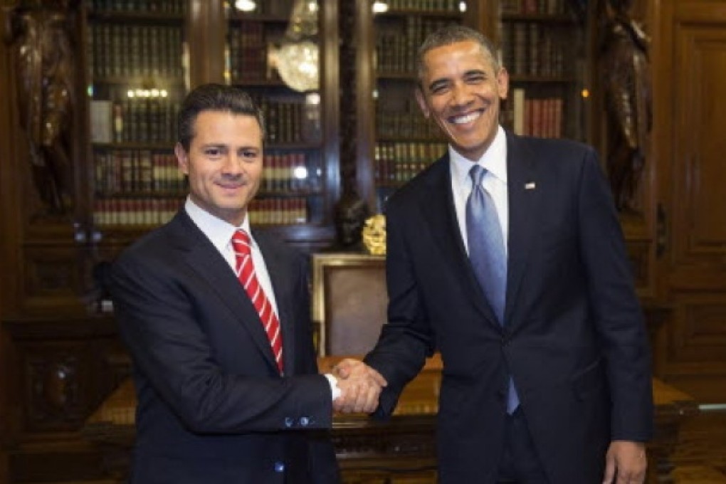 Mexican President Enrique Pena Nieto (L) with his US counterpart Barack Obama (right) during a meeting at the National Palace in Mexico City, Mexico. Photo: EPA