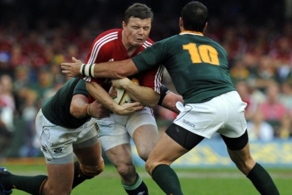 Brian O'Driscoll is tackled by South Africa's Ruan Pienaar during the 2009 Lions tour. Photo: AFP