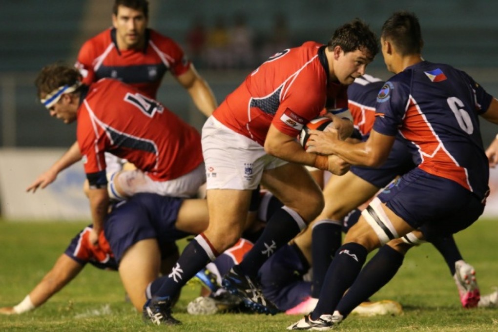 Hong Kong hooker Tom Bolland attempts to power through the Philippine defence in their A5N Top Five match at Rizal Stadium.