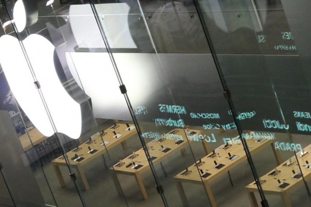 The Apple logo burns brightly at night at the tech giant's store in Causeway Bay. Photo: Edward Wong