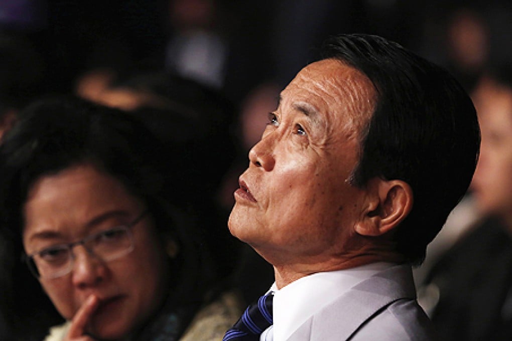 Deputy Prime Minister Taro Aso in New Delhi. Photo: Reuters