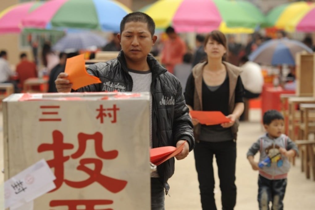 Village residents cast their vote during elections in Wukan, southern Guangdong province on March 4, 2012. Photo: AFP