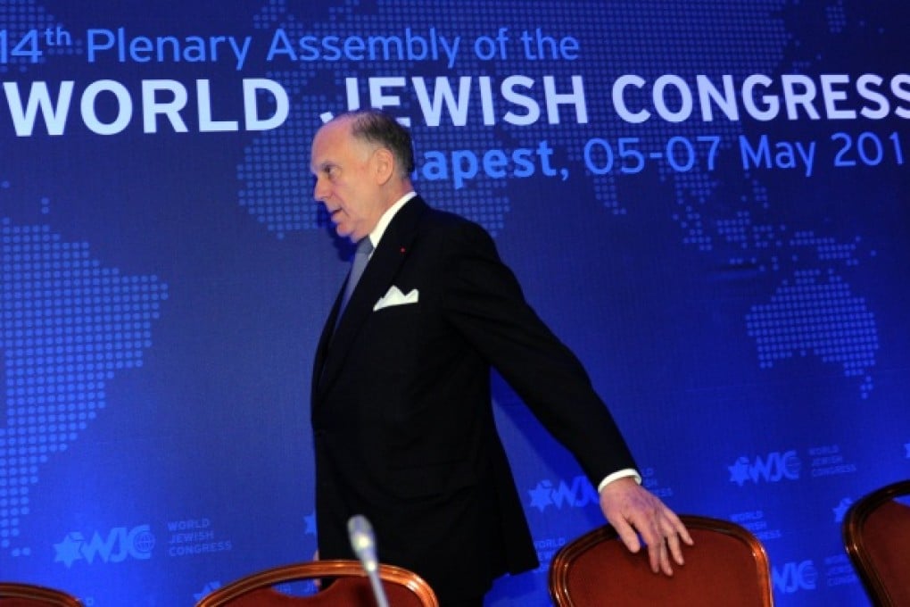 President of the World Jewish Congress (WJC) Ronald S Lauder walks on the podium in Budapest. Photo: AFP