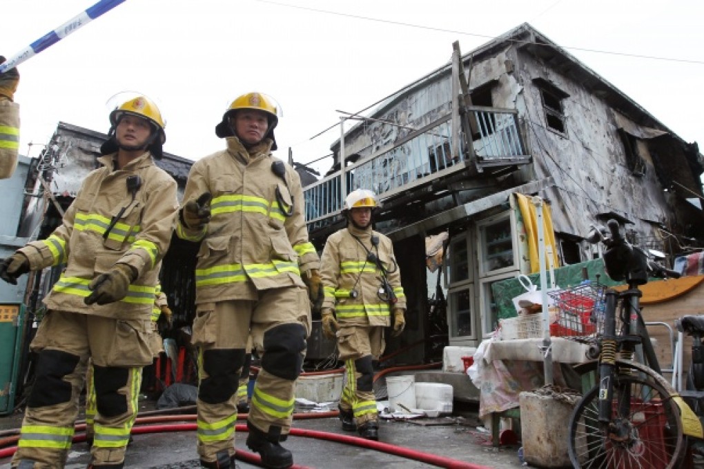 Follow up on Tai O 3nd alarm fire in Kat Hing Street. The accident damaged stilt houses near the river and caused no injury. Photo: Nora Tam