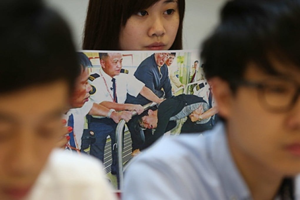 Those involved in the campus protest hold a press conference yesterday, saying security guards mistreated them. Photo: Sam Tsang