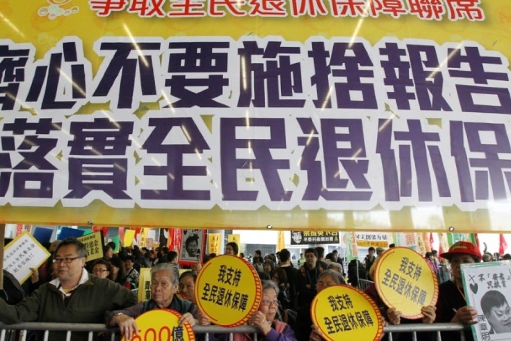 Protestors of The Alliance for Universal Pension petition outside Legislative Council in Tamar. Photo: K. Y. Cheng