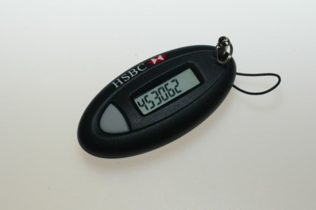 The e-mail scam tricked 13 people into revealing the code generated by personal security devices after malware steers them to fake websites. Photo: Edmond So