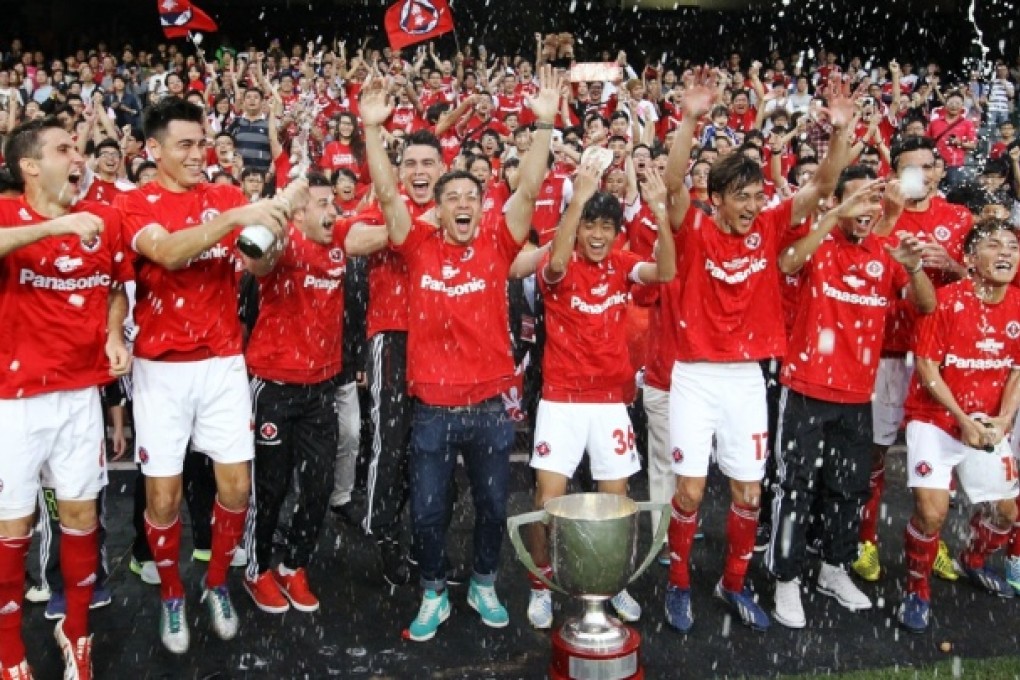 South China players celebrate winning the RedMR First Division despite losing the final match of their campaign 4-3 against Sun Hei at Hong Kong Stadium. Photo: Edward Wong