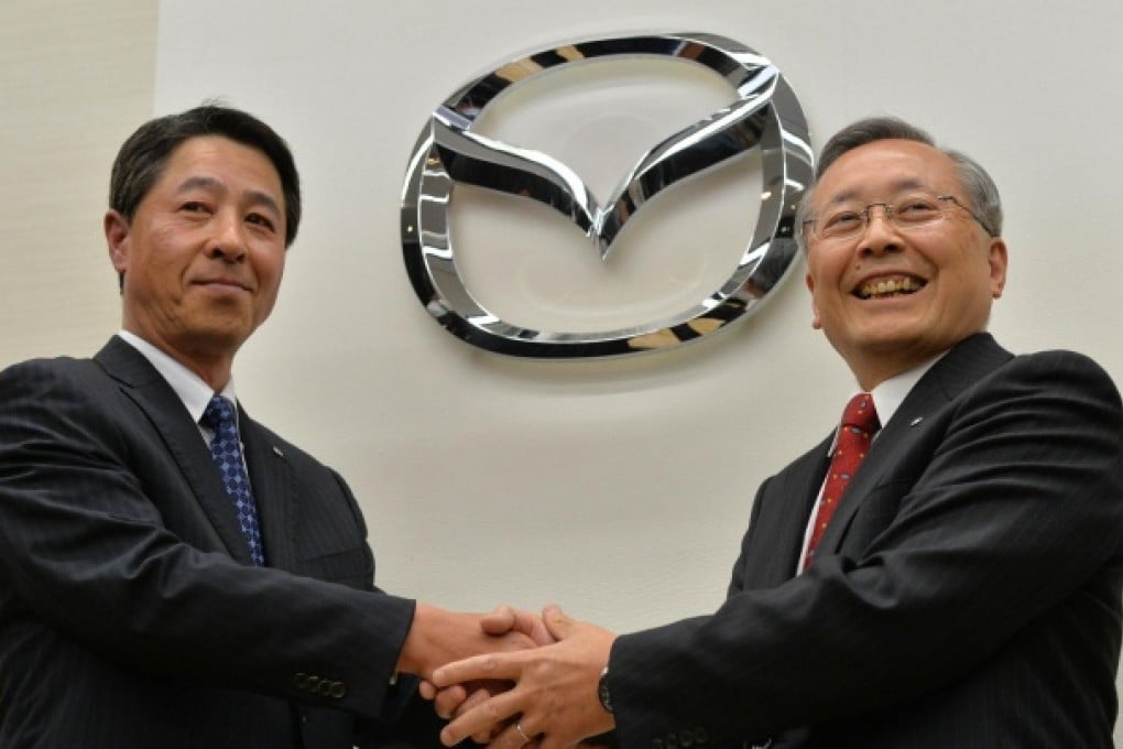 Takashi Yamanouchi (right) and Masamichi Kogai.