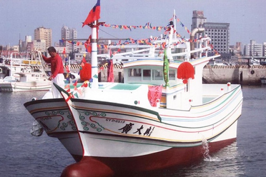 The Guang Ta Hsin 28 fishing vessel at a harbour of Liuqiu before it allegedly came under fire from a Philippine government boat. Taiwan is demanding the Philippines probe the death of a fisherman on the boat. Photo: AFP