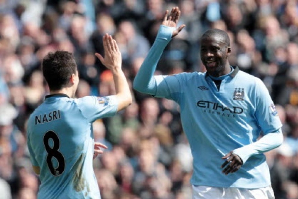 Manchester City's Manchester City's Ivorian midfielder Yaya Toure (right). Photo: AFP