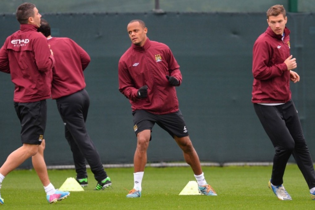 Manchester City's players attend a training session on the eve of the English FA Cup Final. Photo: AFP