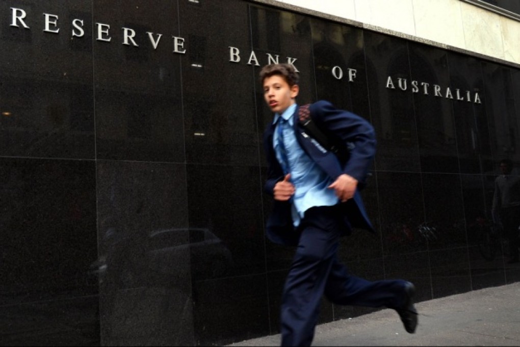 The Reserve Bank of Australia said it expected growth of 2.5 per cent and inflation of 2.25 per cent for the year to December 31, compared with forecasts in February of up to 3 per cent for both. Photo: AFP