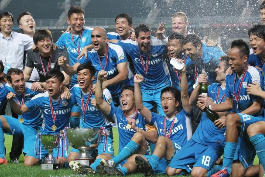 Kitchee players celebrate after defeating Sun Pegasus 1-0 in yesterday's FA Cup final at Hong Kong Stadium. Photo: Nora Tam