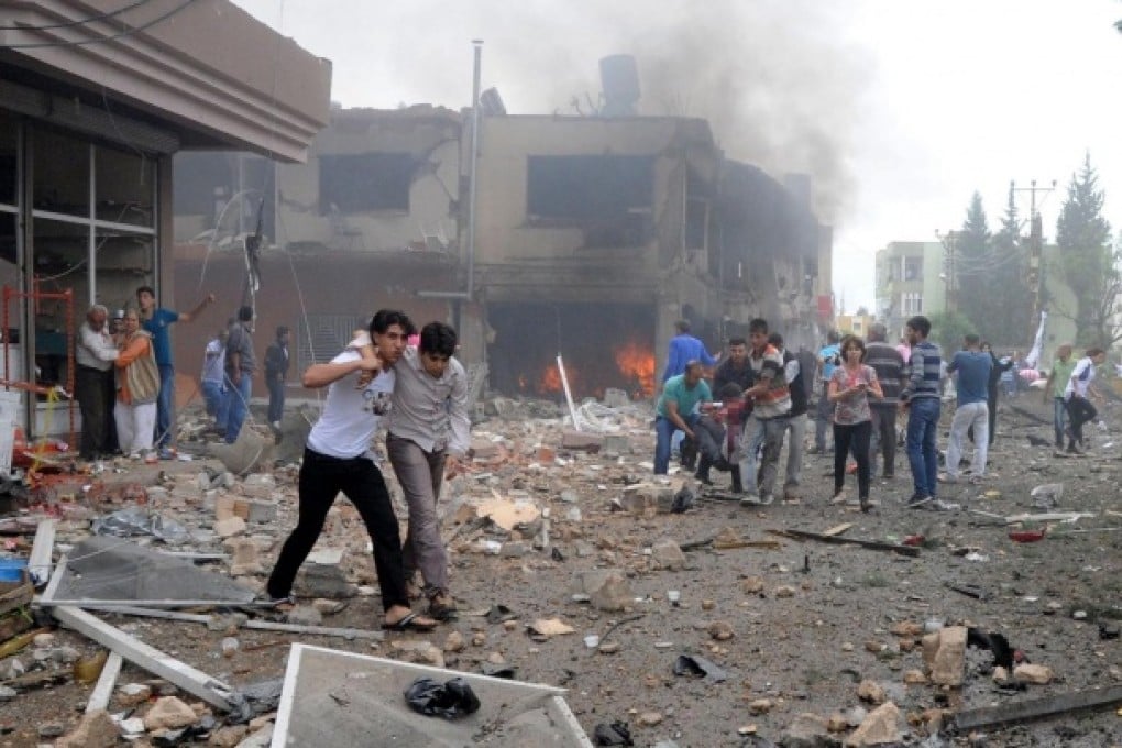 The bombs targeted Reyhanli's town hall and post office. Photo: EPA