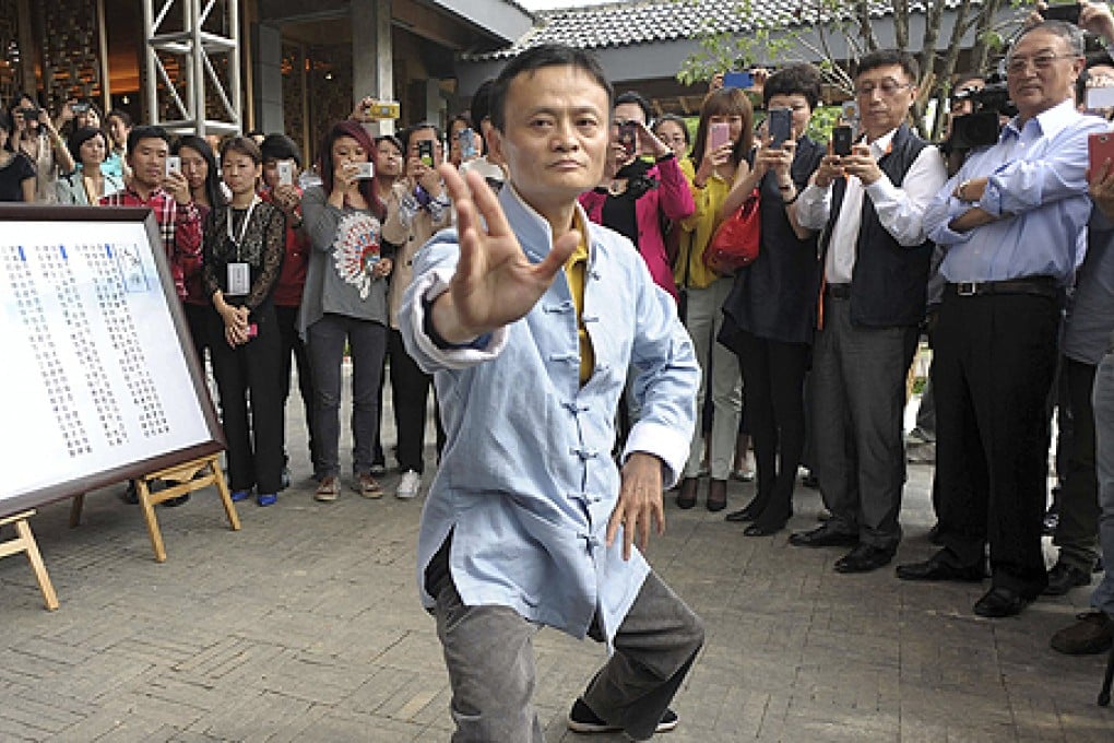 Former Alibaba CEO Jack Ma performs tai chi at the opening ceremony. Photo: Reuters