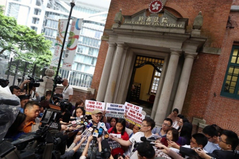 The report said there had been no evidence of government interference in the Legal Aid Department, citing the case involving domestic helpers' right of abode as one of the examples. Photo: Sam Tsang