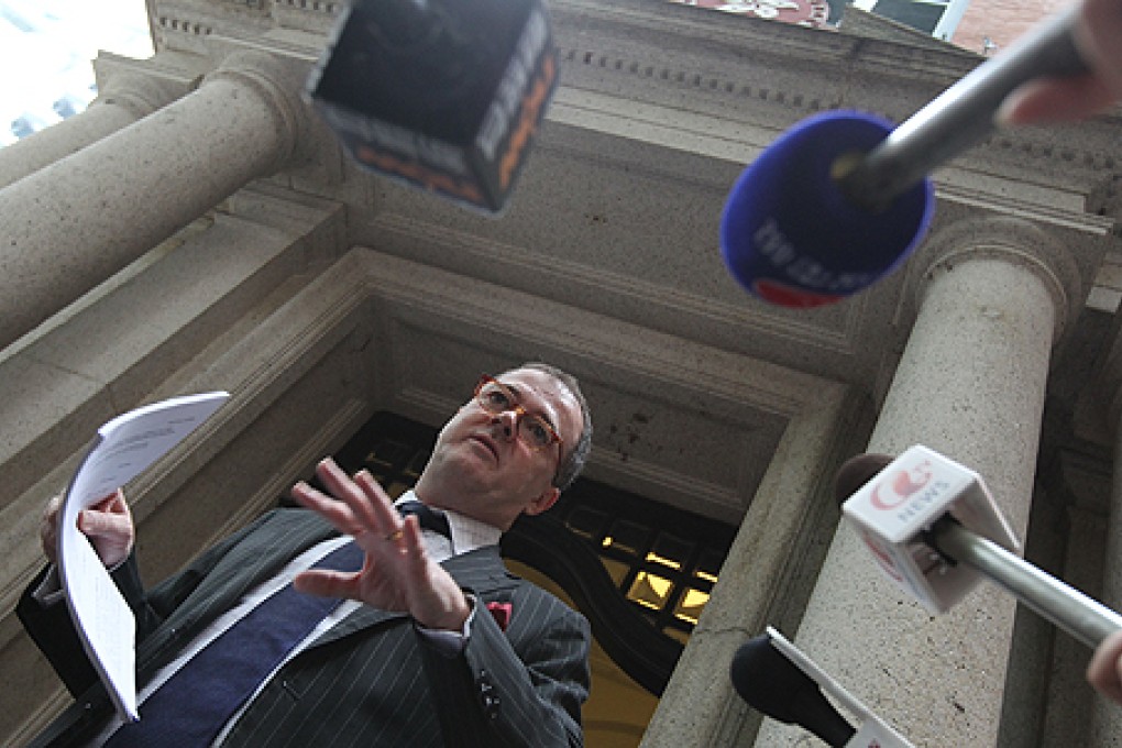 Michael Vidler, the solicitor for transsexual "W", speaks to the media outside the Court of Final Appeal after the ruling. Photo: K. Y. Cheng