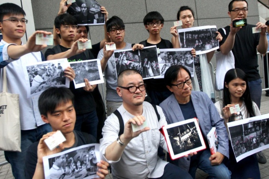 Several people who were active in anti-national education protests went to find out if they are on police wanted lists. Photo: David Wong