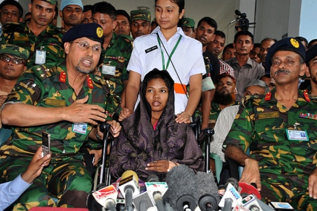 A young female garment worker meets with the media at a hospital in Savar, Dhaka. Rescuers found Reshma clinging to life sandwiched between two floors of the collapsed eight-storey building. Photo: Xinhua