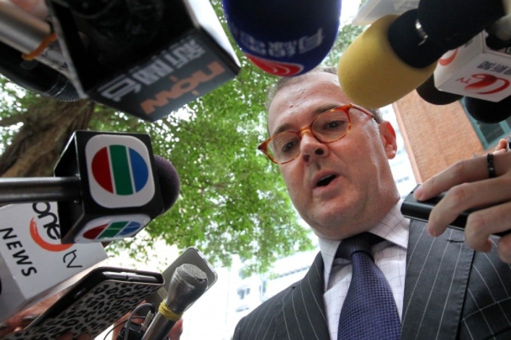 Michael Vidler, lawyer of Madam W, speaks to media outside Court of Final Appeal in Central after the court ruled that transsexuals have the right to get married. Photo: K. Y. Cheng
