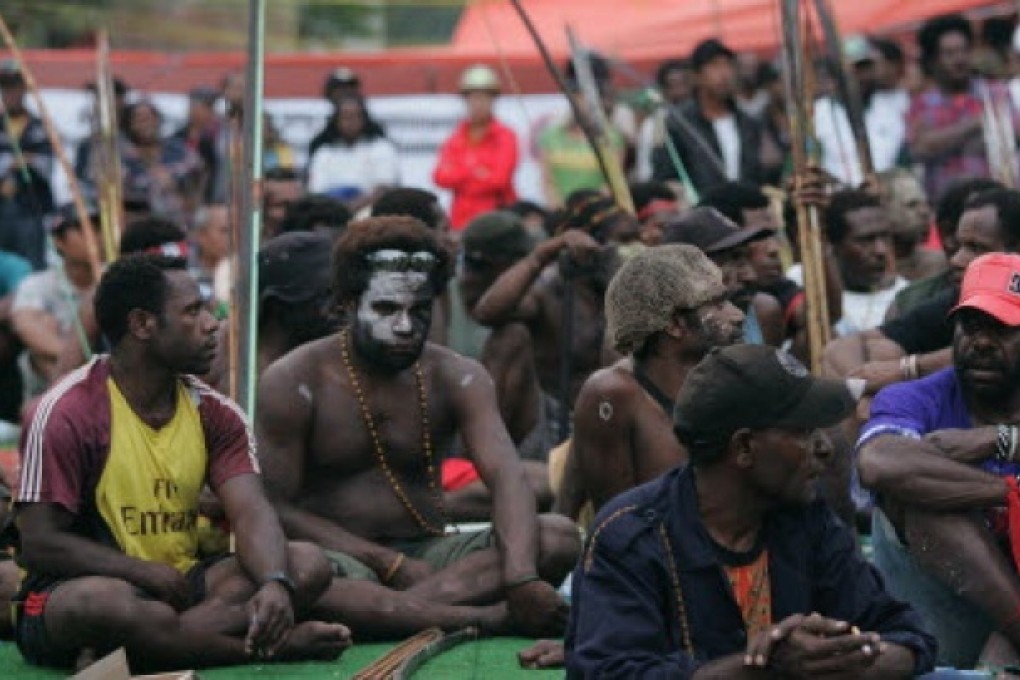 Workers from Freeport-McMoRan Copper & Gold's Grasberg mine in the Mimika district in Papua. As many as 30 miners were trapped underground on Tuesday after a tunnel caved in at the mine. Photo: Reuters