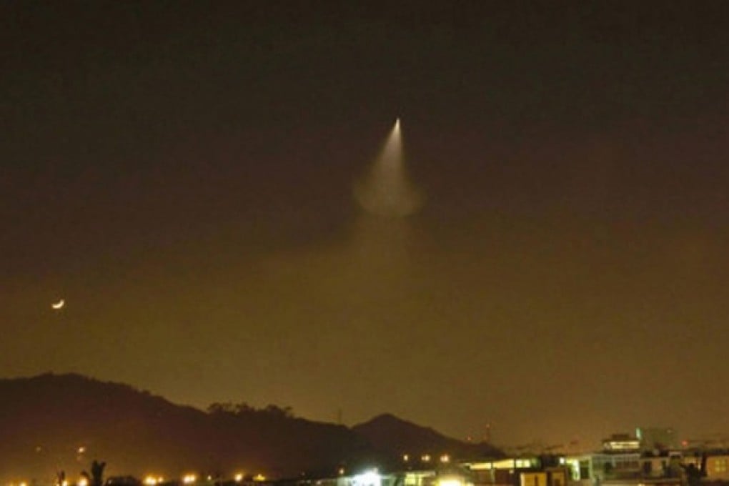 Residents in cities across the mainland, and including Hong Kong, reacted with alarm on Monday when they saw this apparition high in the skies above Sichuan, as seen in this image taken by a Hong Kong resident. Photo: Wah