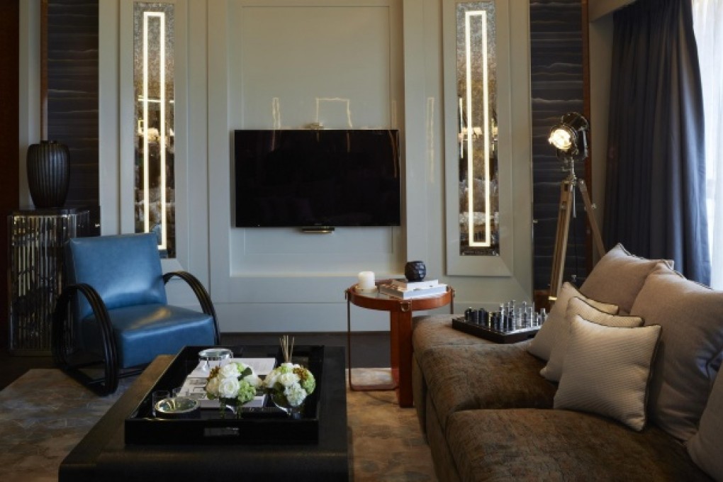 High fashion is coming off of the catwalk and into better-dressed homes, as high-profile designer brand names, like this Ralph Lauren styled room, are focusing on accessories and furniture.