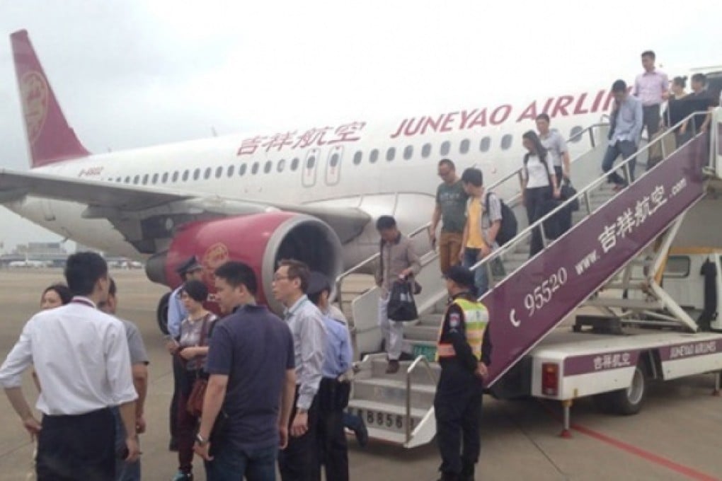 A Juneyao flight returns to Shanghai after receiving threat. Photo: screenshot via Weibo