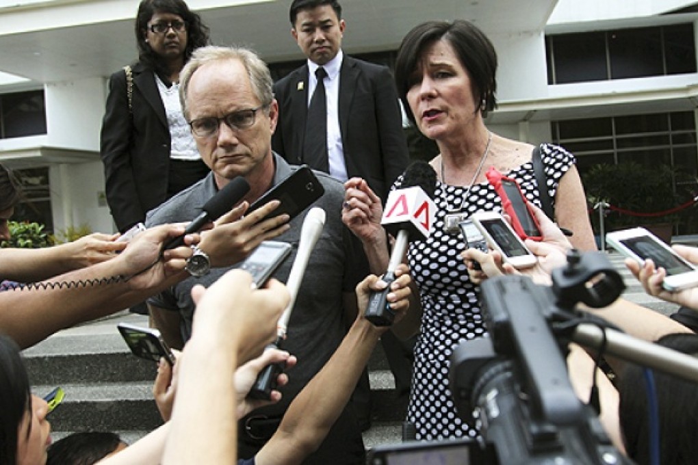 Rick and Mary Todd, parents of late American software engineer Shane Todd, leave the Subordinate Courts of Singapore on Wednesday, in Singapore. Photo: AP