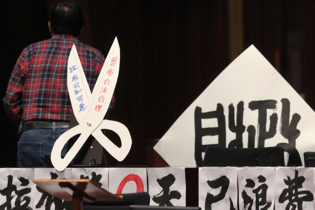 Some legislators displayed anti-filibuster banners during Legco meetings. Photo: Felix Wong