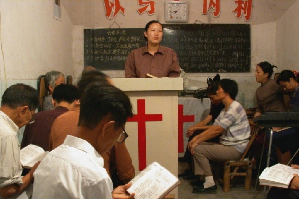 A missionary preaches at a small Christian church in Wuhu, Anhui province. Photos: EPA; SCMP