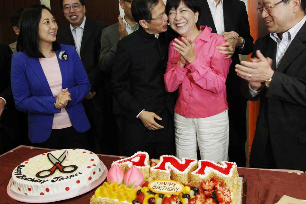 Legco president Jasper Tsang and lawmaker Ann Chiang take a break from debate to celebrate their birthdays yesterday. Photo: David Wong