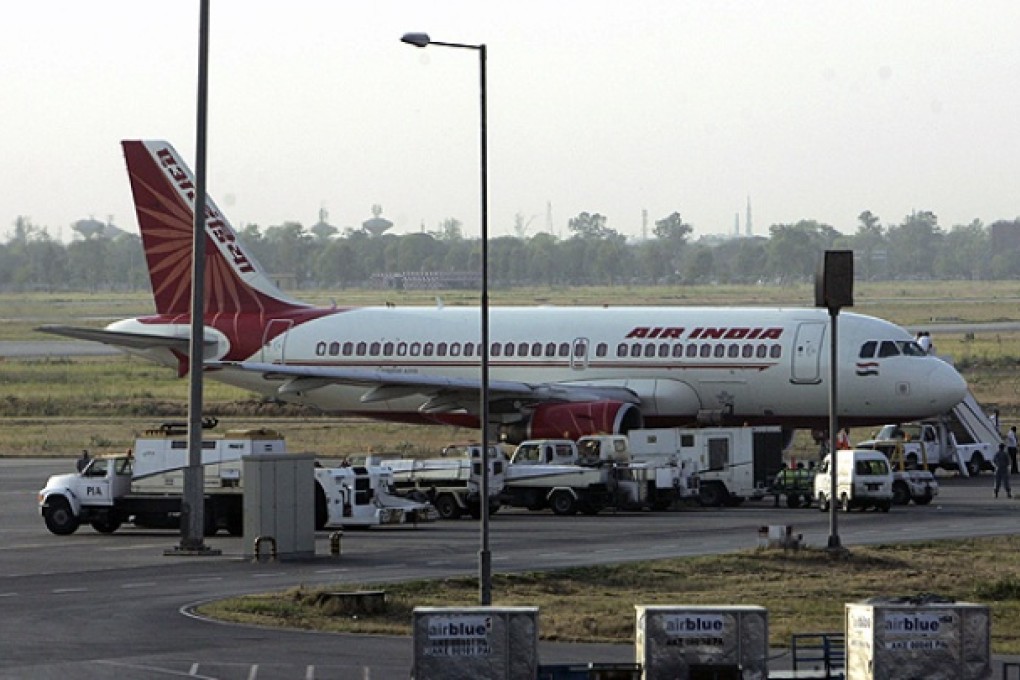 An Air India jet lands in Lahore, Pakistan. Photo: Reuters