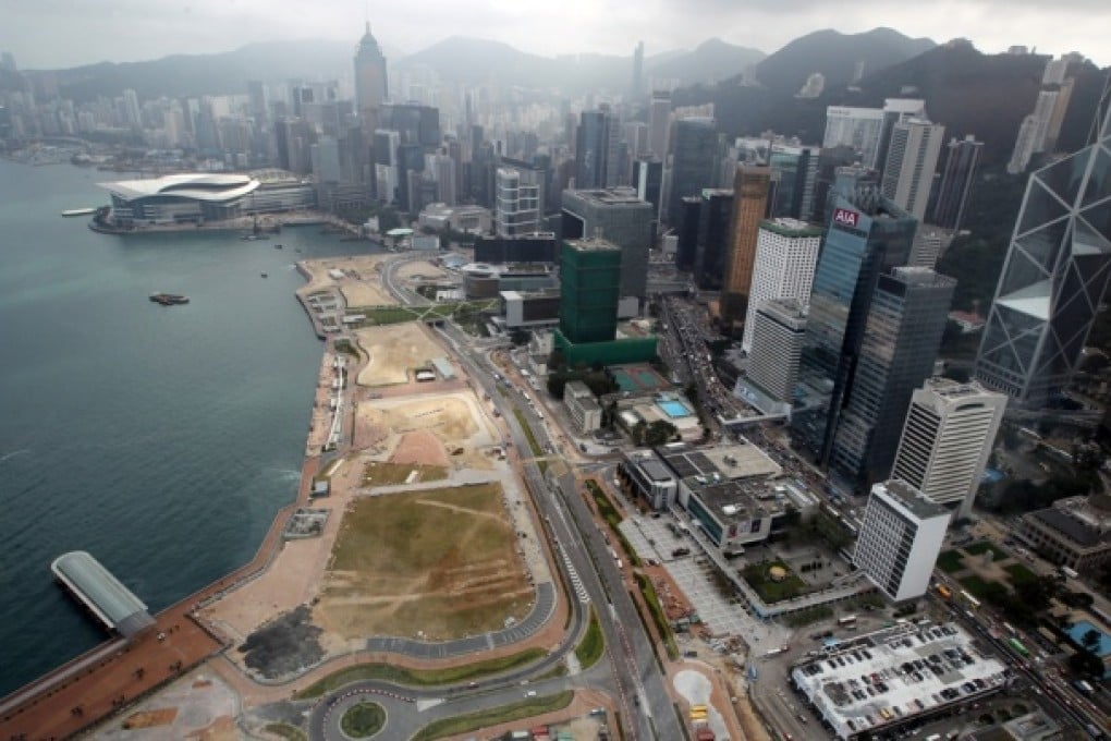 Newly reclaimed land from Central to Wan Chai and what it used to look like with the old Star Ferry Pier. Photo: Sam Tsang