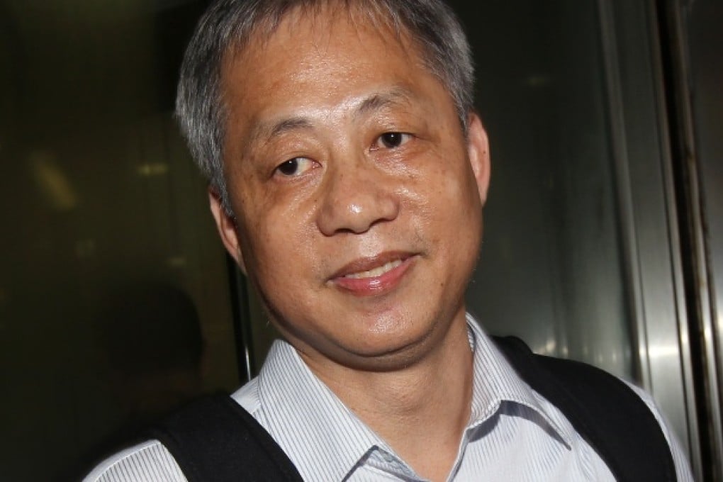 Tam Hoi-chi, leaves Eastern Court in Sai Wan Ho after gave his passenger 50 cents less in change. Photo: David Wong