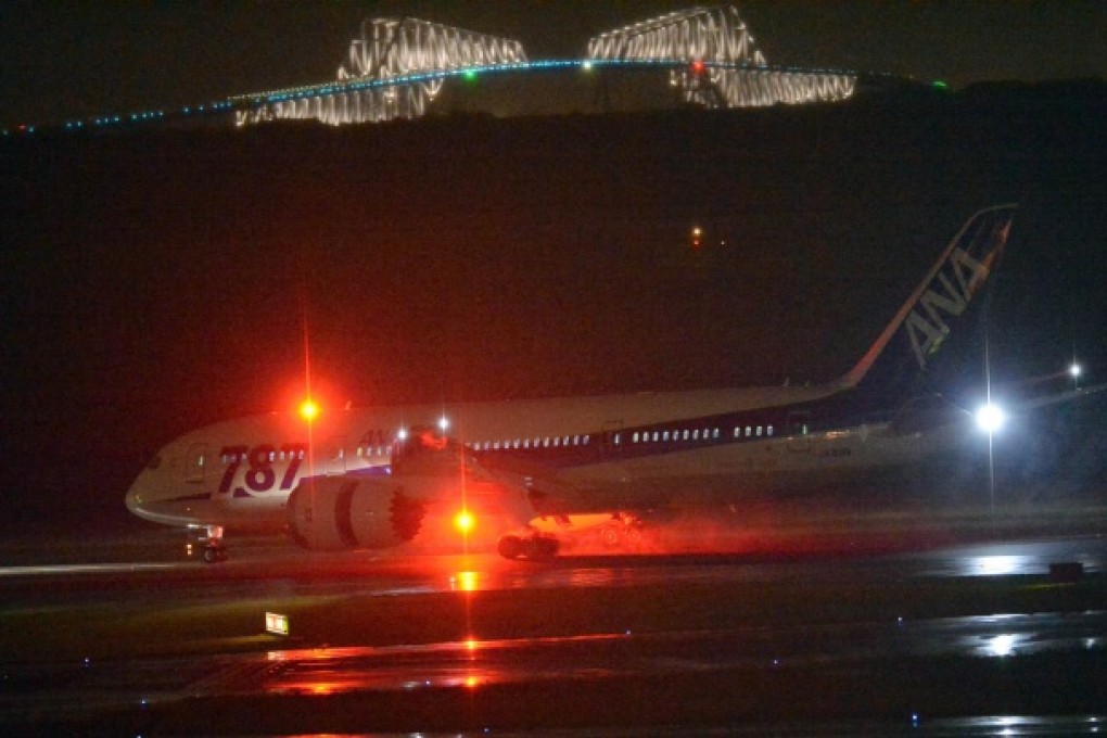 A newly delivered All Nippon Airways Boeing 787 touches down in Tokyo on Thursday. May 16, 2013. ANA has reported a minor fault with a modified Dreamliner, but added that it wasn’t connected to the previous battery problems. Photo: AFP