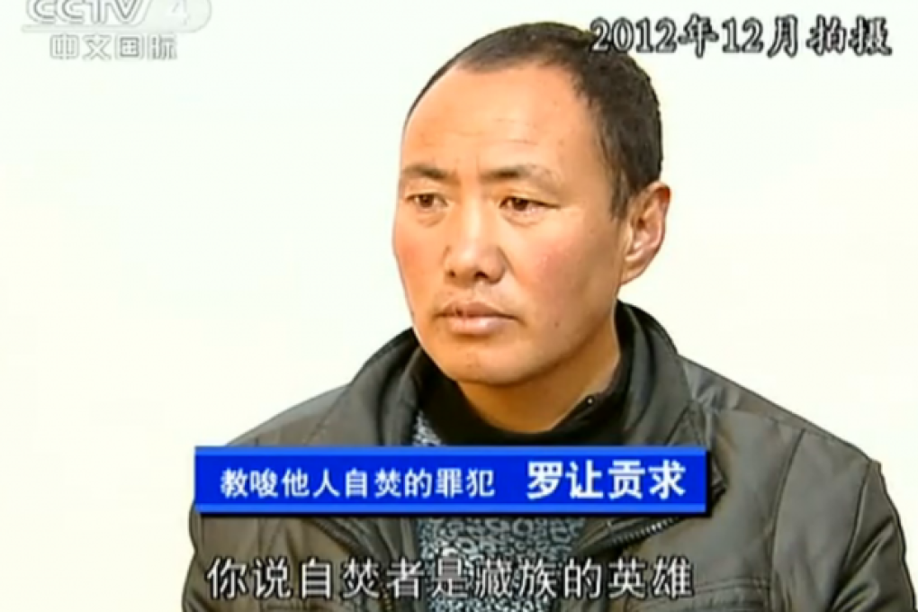 Screenshot from the CCTV report showing a man accused of instigating self-immolations in Aba, Sichuan, aired on May 16, 2013.