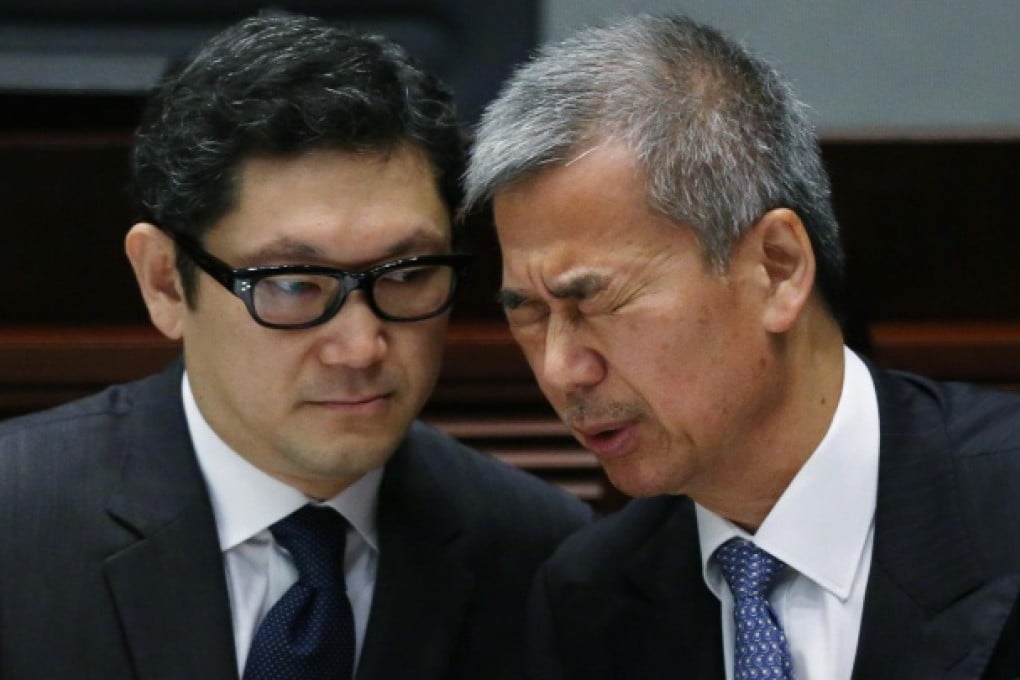 Lawyer Peter Wong Ting-kwong (left) with troubled Timothy Tong during the Legco committee's grilling. Photo: Sam Tsang