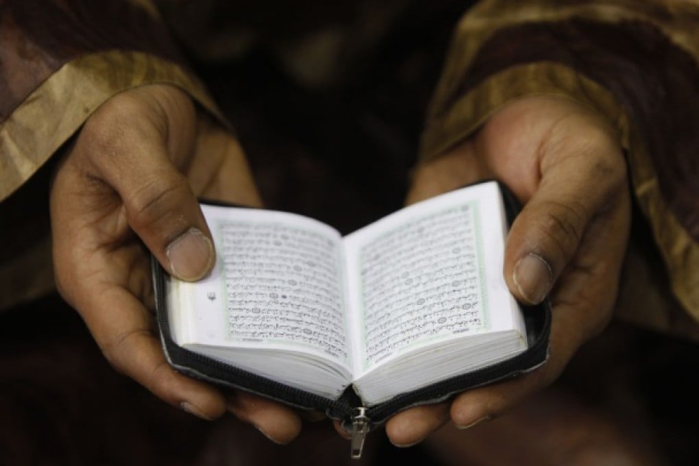 A Chinese manager was accused of desecrating Koran. Photo: Reuters