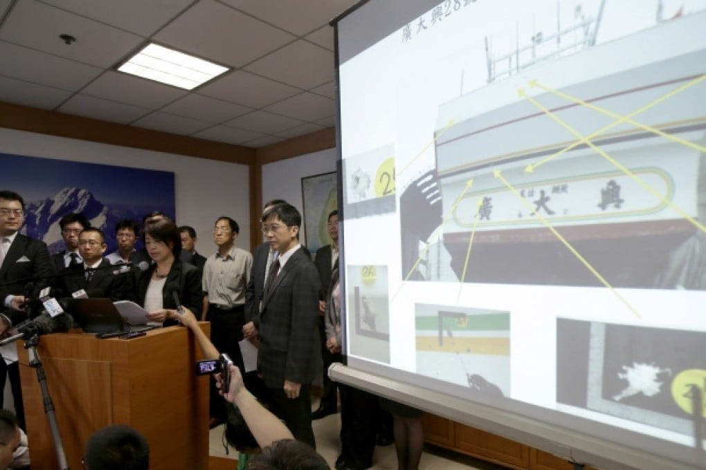 Taiwan's investigation team reports on the killing of a Taiwanese fisherman by the Philippine coast guard. Photo: AP