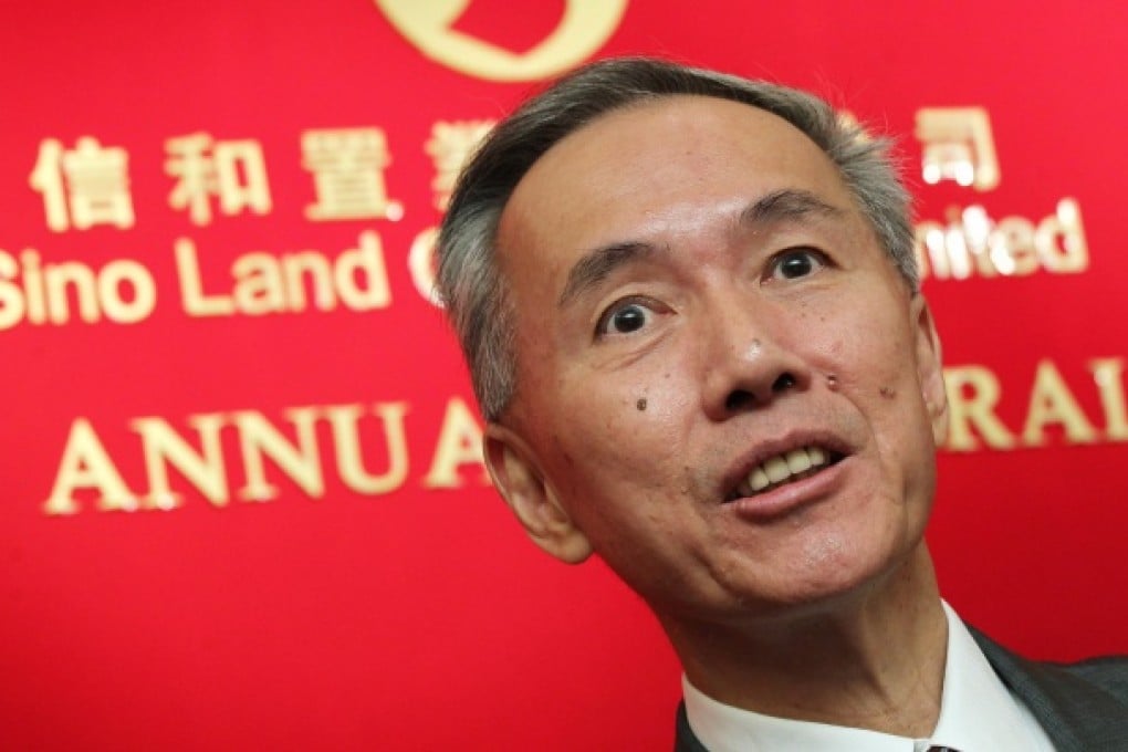 Sino Land chief Robert Ng's firm joined in buying back shares.
