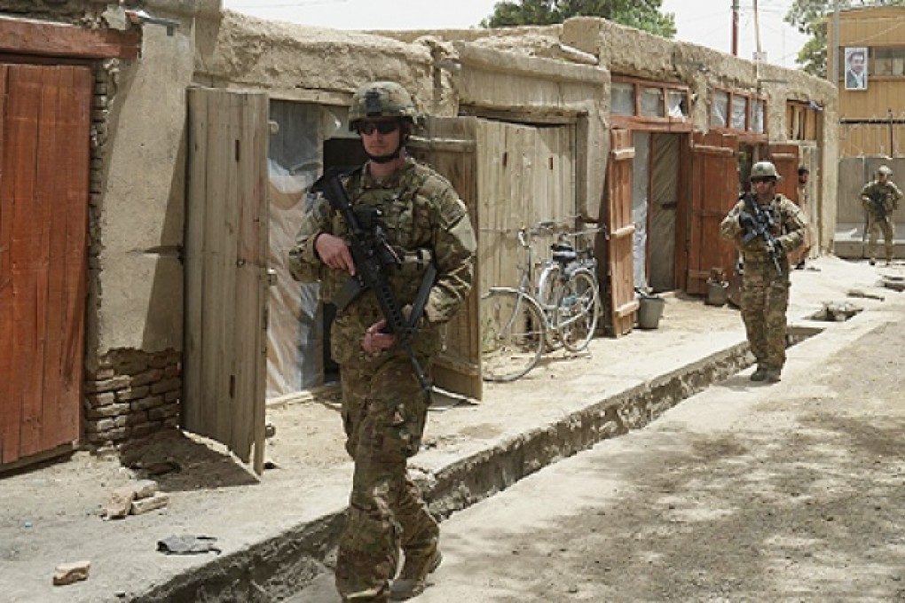 Soldiers patrol in Ghazni city on Sunday. Photo: AFP