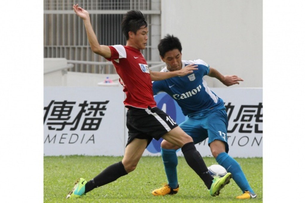 Southern's Chung Hon-chee and Kitchee's Chan Man-fai battle for possession during yesterday's play-off. Photo: Edward Wong