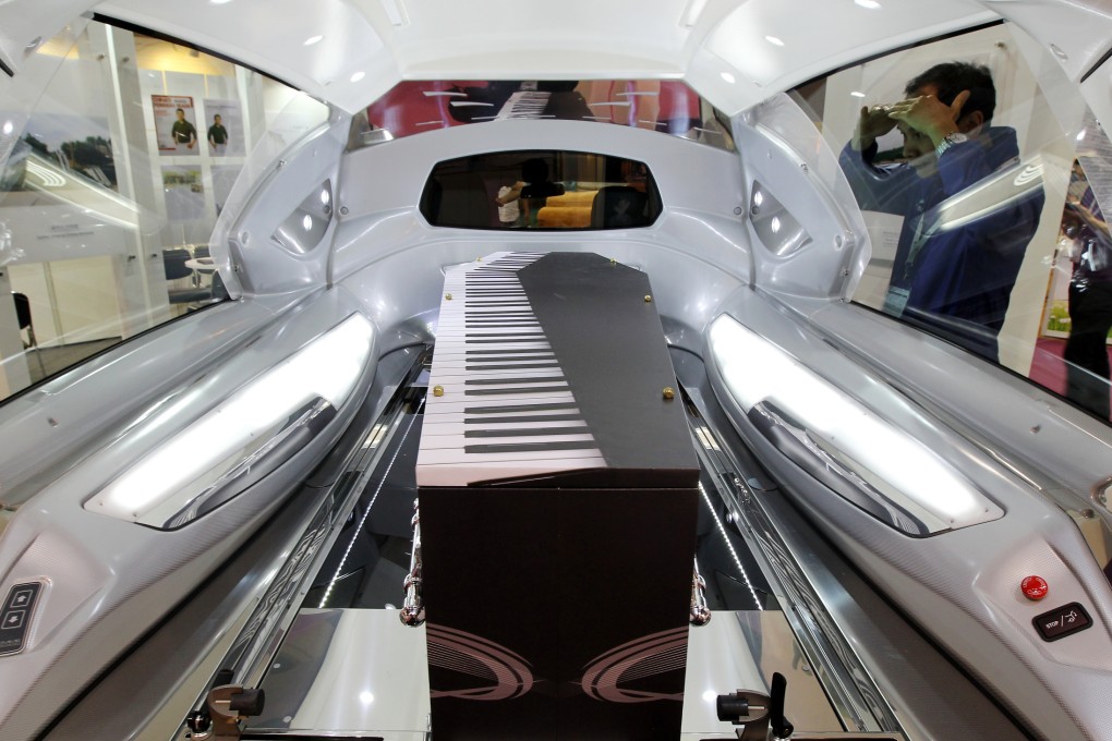 A piano-themed coffin on display in Hong Kong. Photo: SCMP/K.Y. Cheng