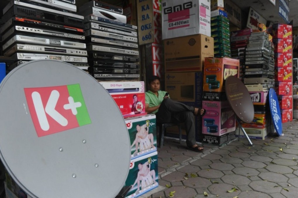 The local Vietnamese satellite television broacaster K + has stopped airing foreign channels including CNN, BBC and Star World to comply with a new media law. Photo: AFP